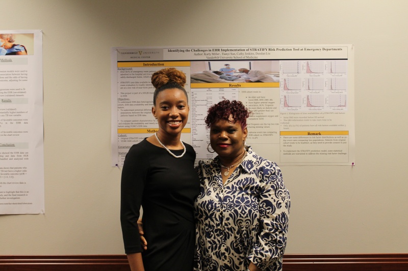 Karly Miller and her mom in front of her poster