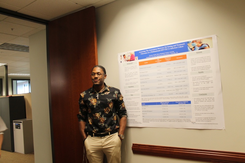 Terrence Smith standing with his poster