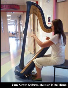girl playing harp