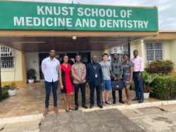 Student at KATH Ghana with colleagues