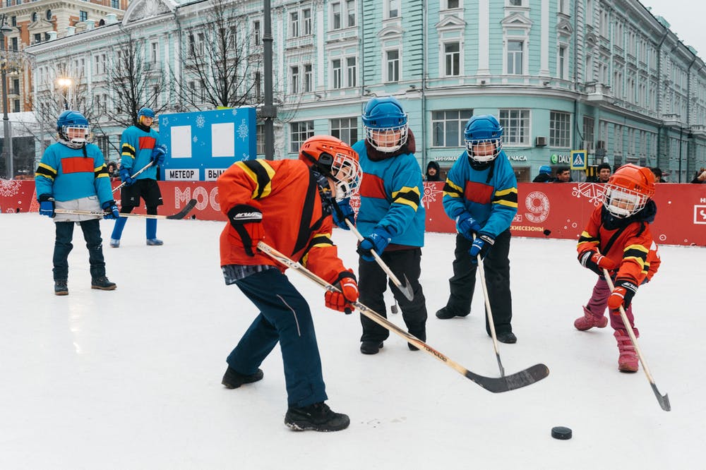 Winter sports hockey with helmets