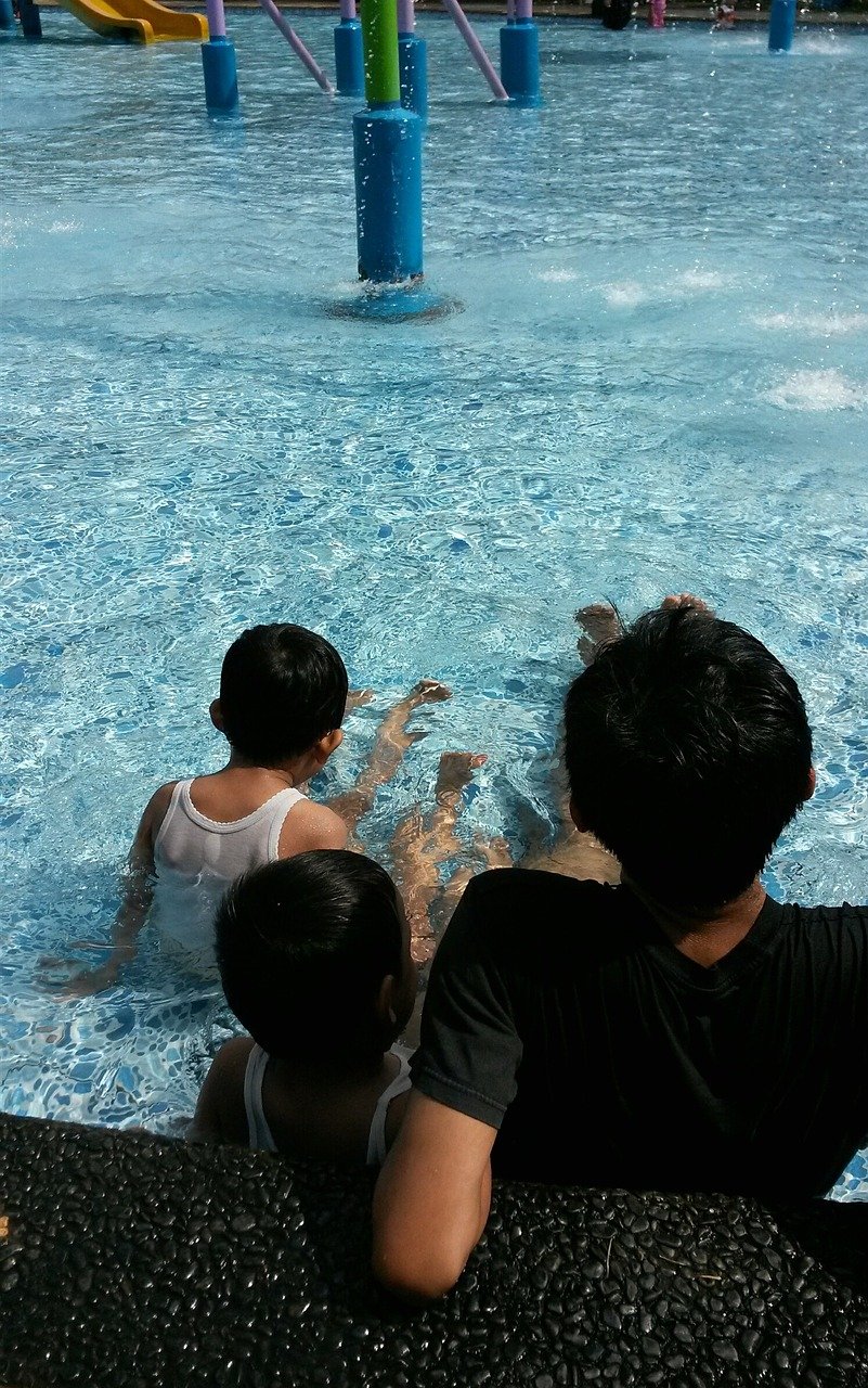 family in splash pad