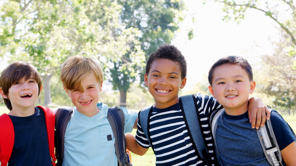 photo of a group of happy boys standing together