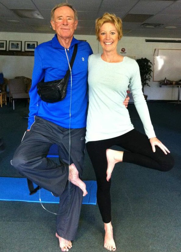 Ray Morris doing a yoga pose with daughter Tisha_0.png