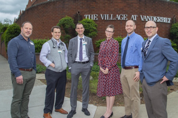 Group in front of the bridge clinic location